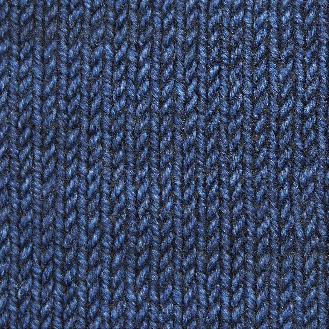 Hand-dyed skein of Symfonie Luna yarn in Blue Sapphire