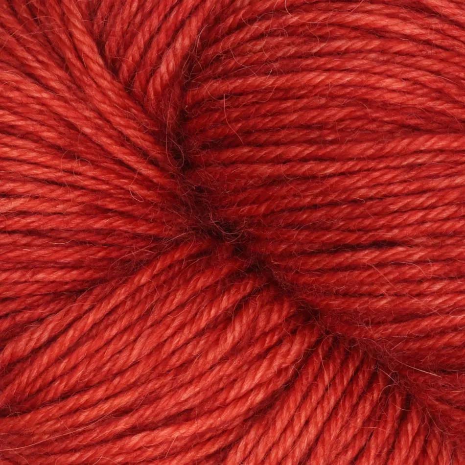 100g skein of Symfonie Serra yarn in Ember Red