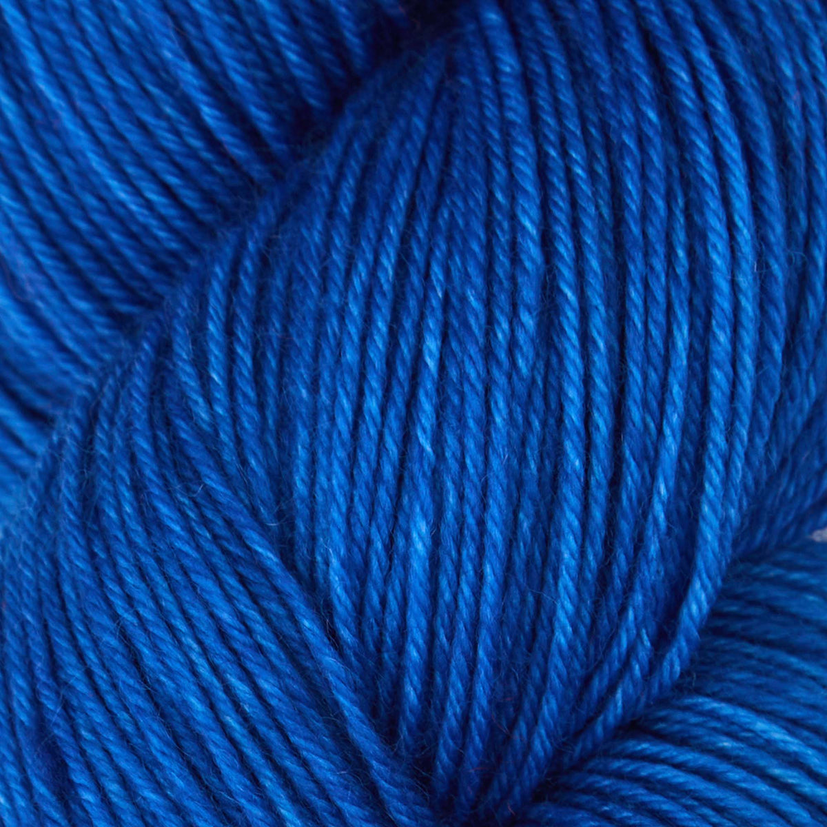 100g skein of Symfonie Terra yarn in Cobalt Blue