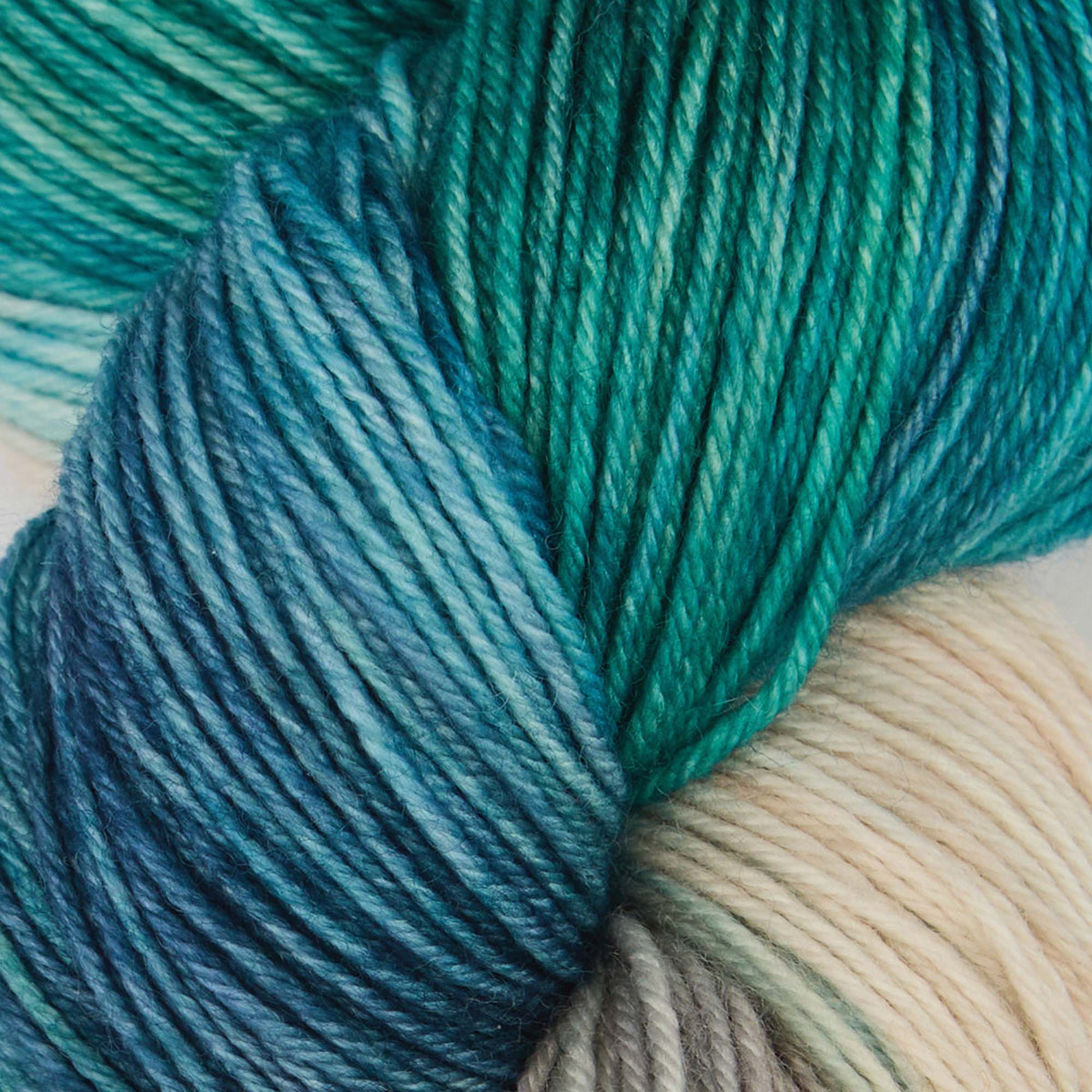 Skein of Symfonie Terra sock yarn in Sandy Sea