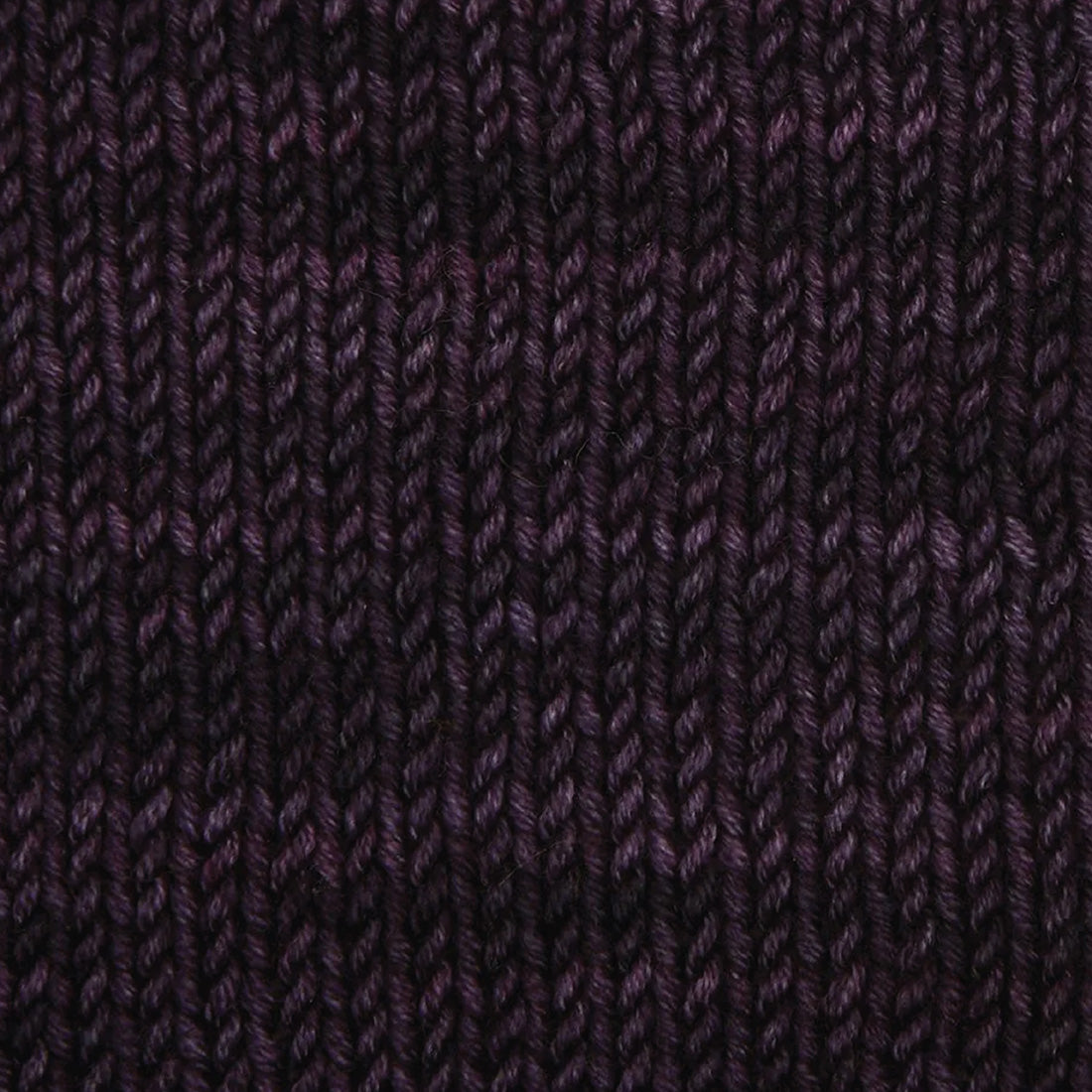 Skein of Symfonie Viva DK merino yarn in Aubergine