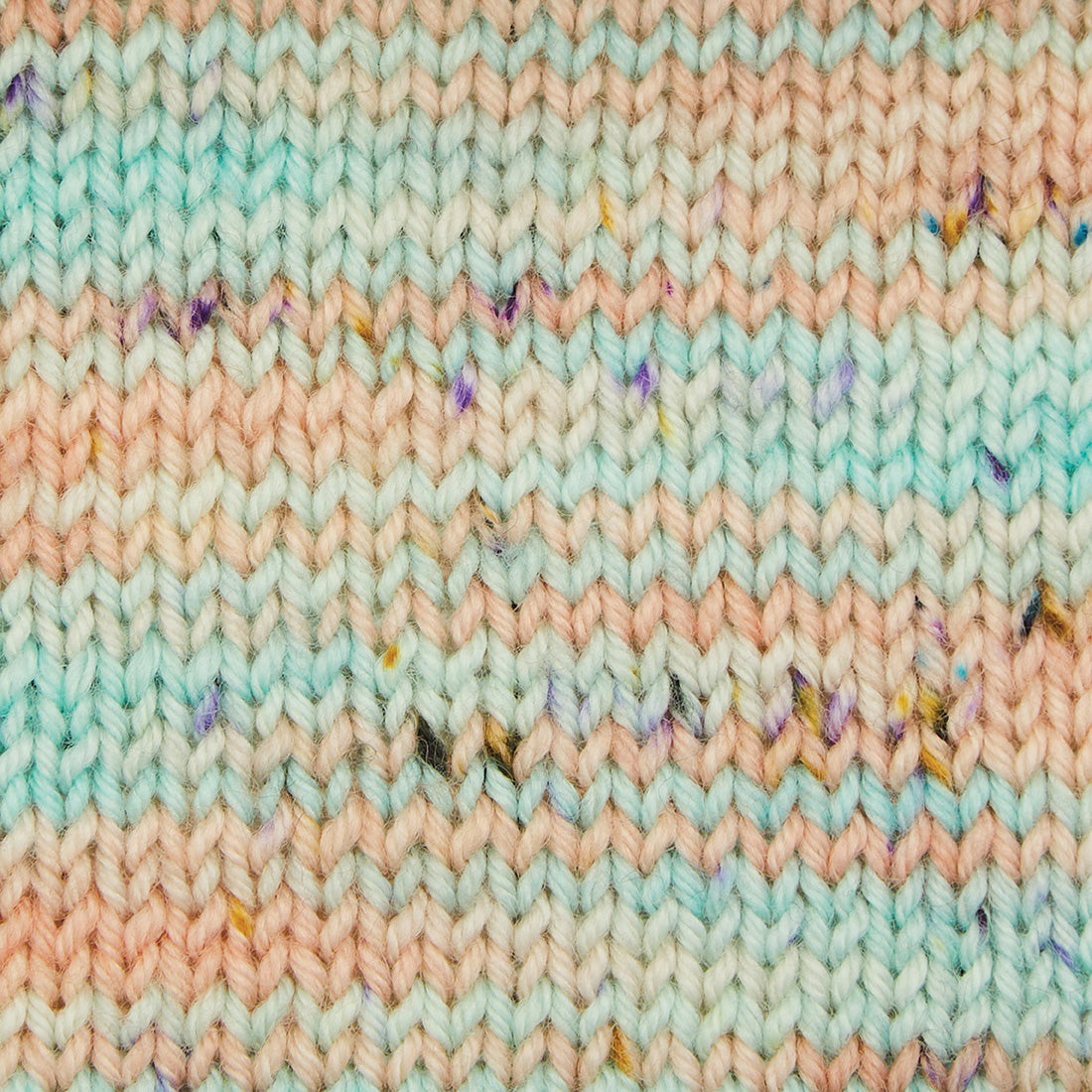Skein of Symfonie Viva DK merino yarn in Bonnie Blooms