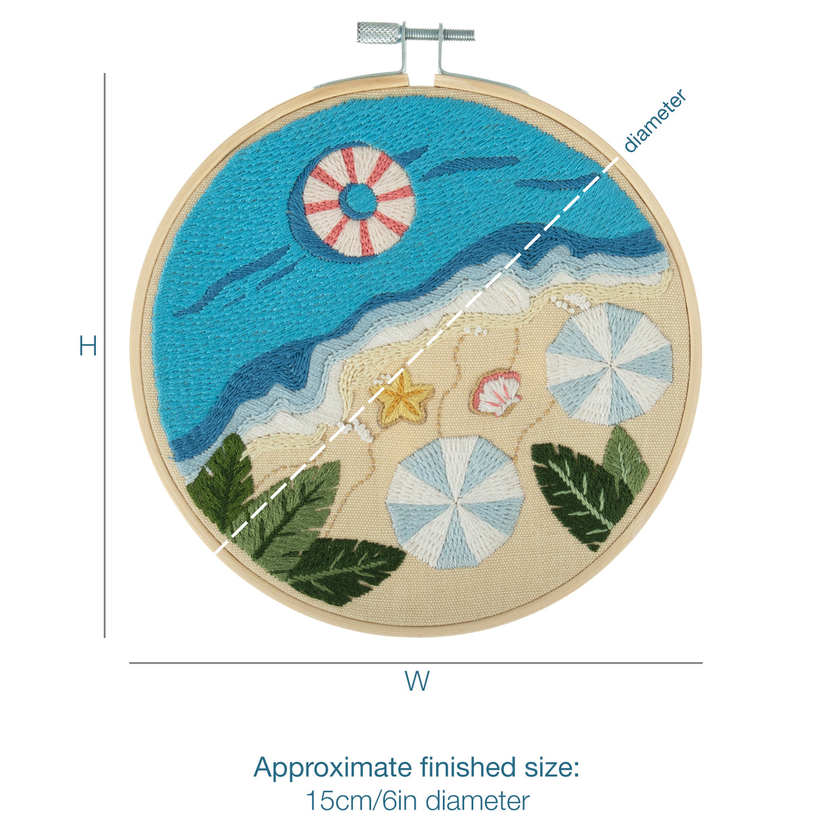 Embroidery hoop kit showing a stitched beach design