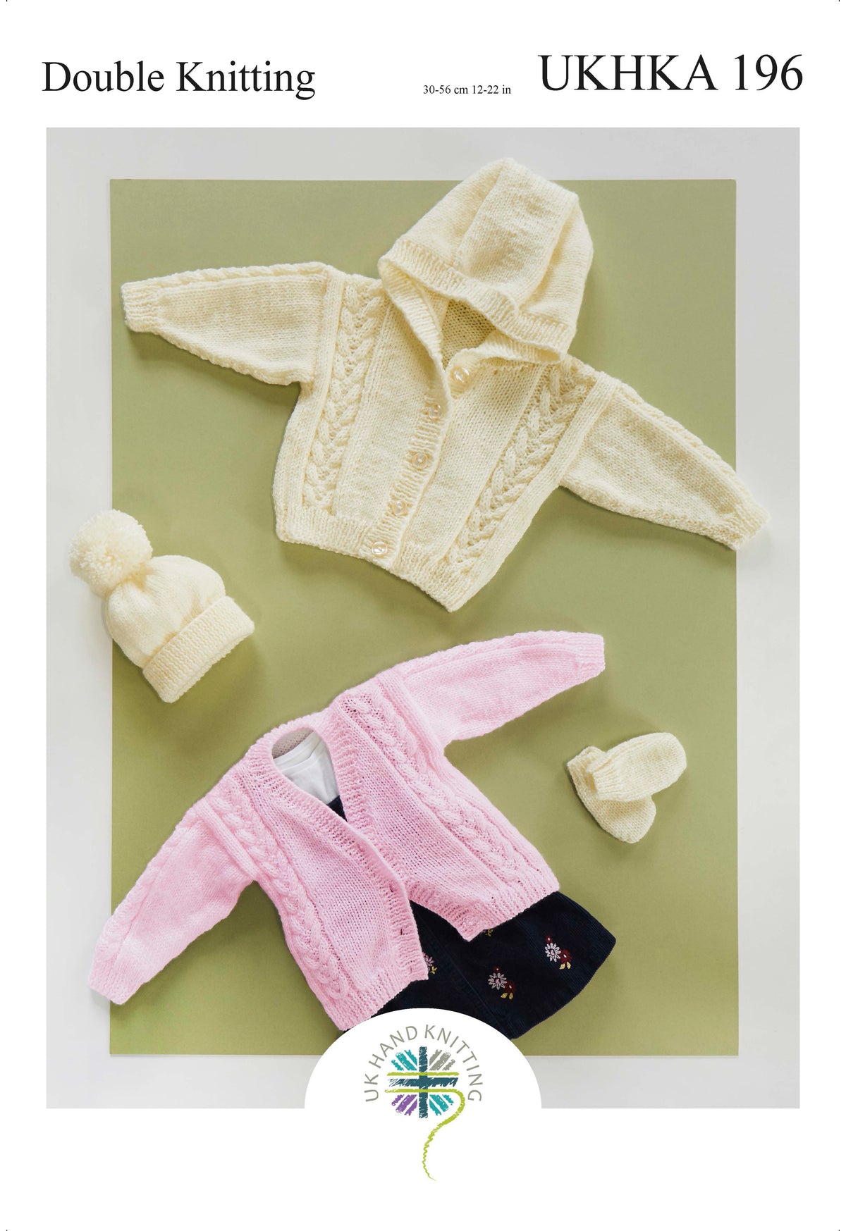 Cover of a UK Hand Knitting Association knitting pattern showing baby cardigans, a hat and mittens