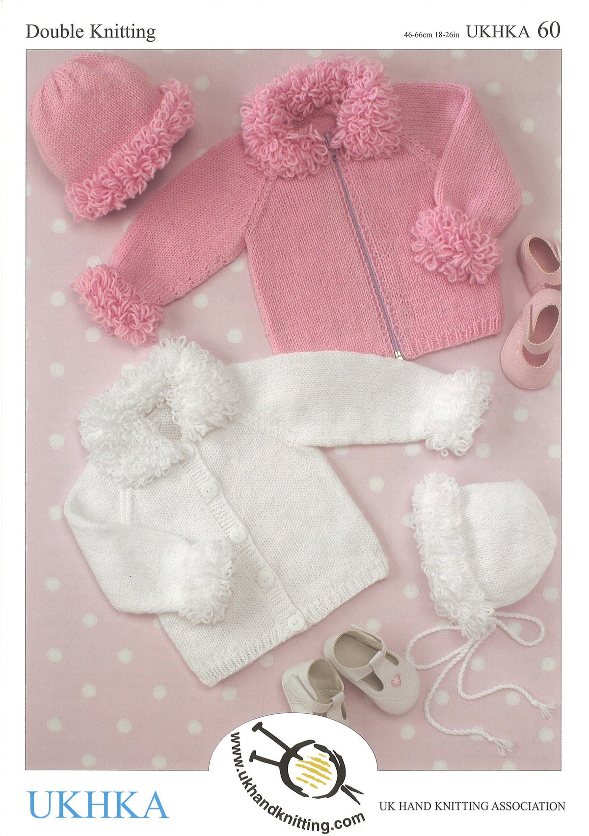Cover of a UK Hand Knitting Association knitting pattern showing children's cardigans, a hat and a bonnet