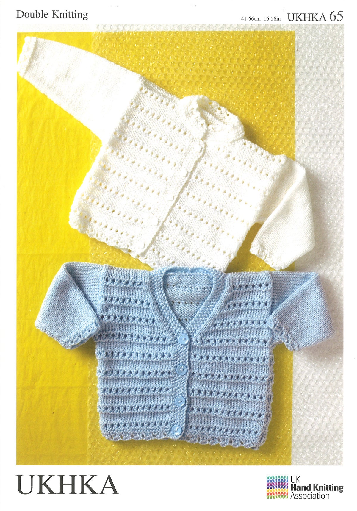 Knitting pattern cover showing children's ridge stitch cardigans