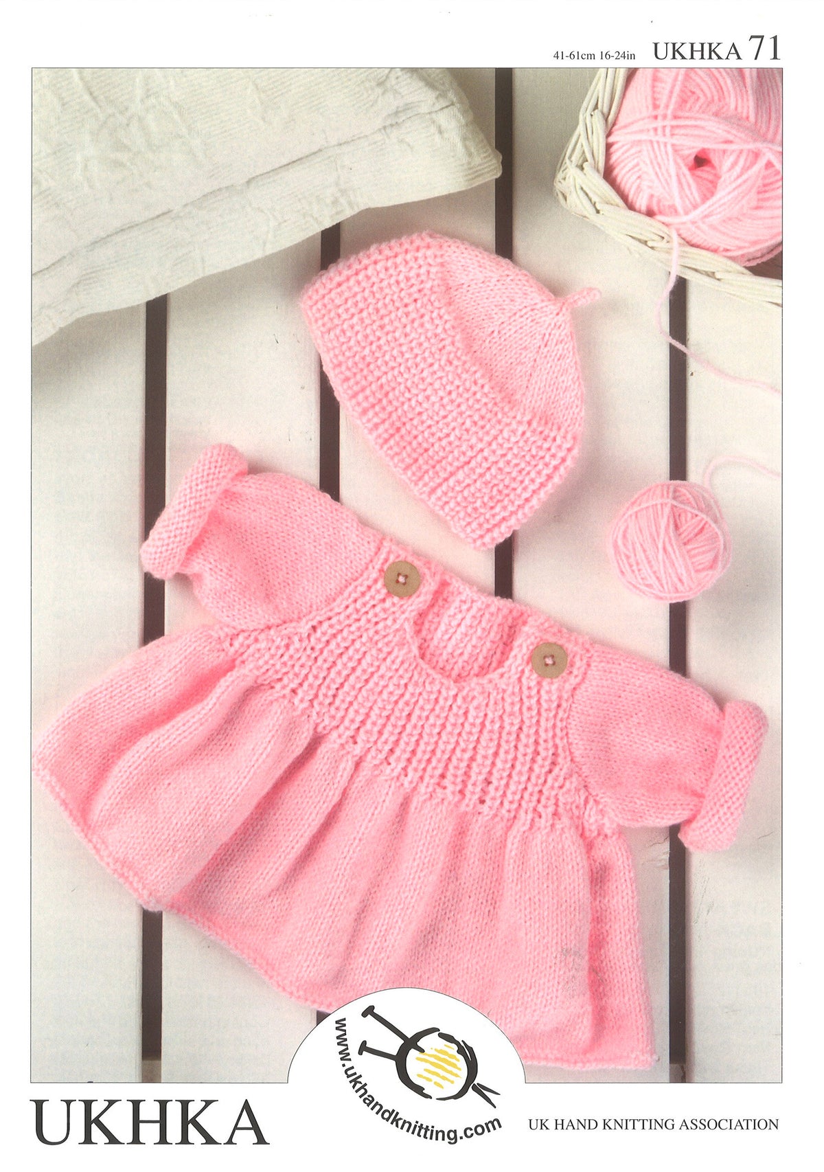 Cover of a UK Hand Knitting Association knitting pattern showing a flared sweater and hat