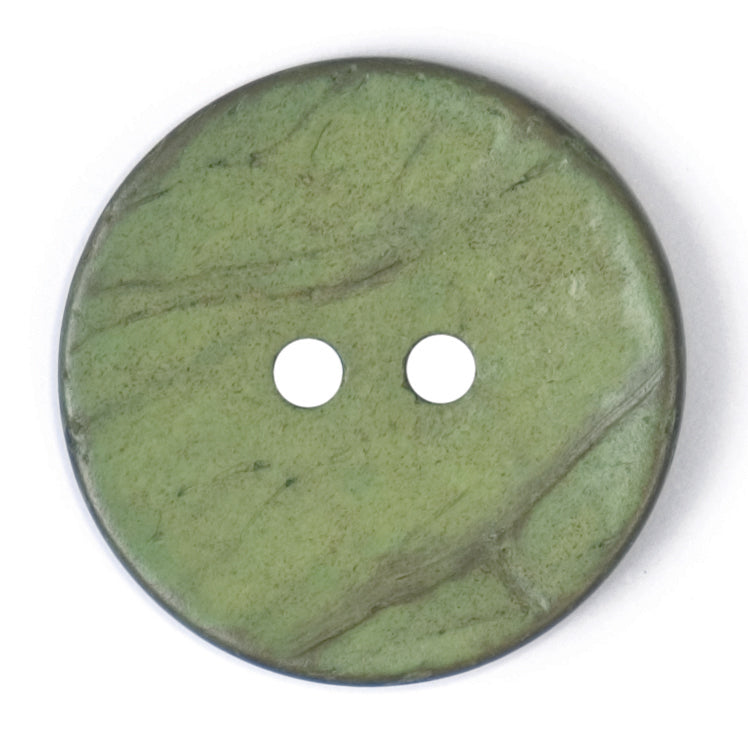 Close-up of olive green round buttons, 22mm