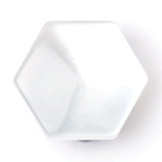 White hexagonal buttons with a faceted top