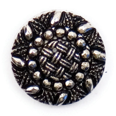 Ornate black and silver-tone button with a filigree pattern
