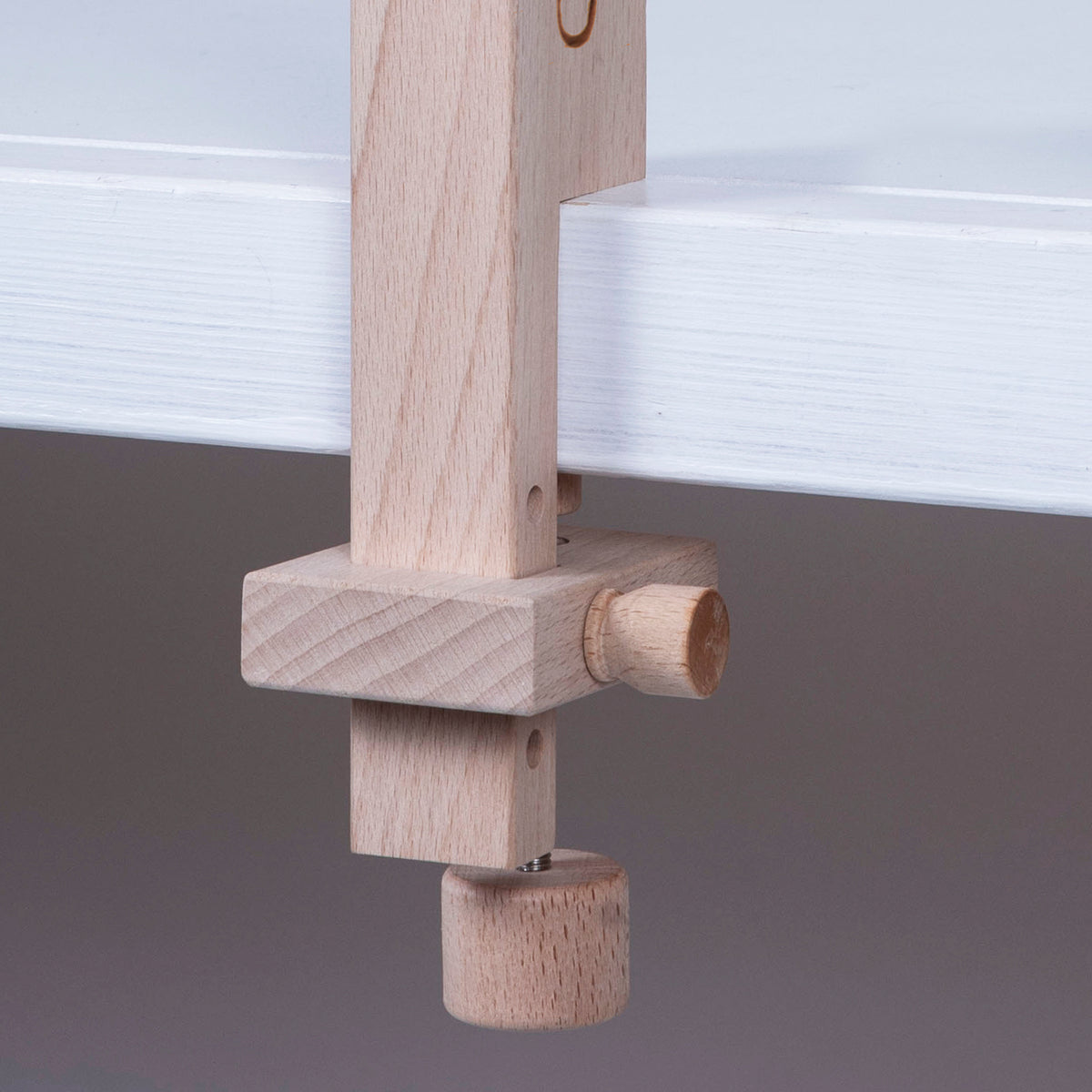 Two wooden Milward table clamp pieces for a tapestry frame