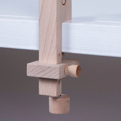 Two wooden Milward table clamp pieces for a tapestry frame