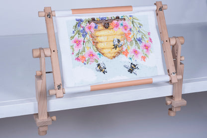 Two wooden Milward table clamp pieces for a tapestry frame