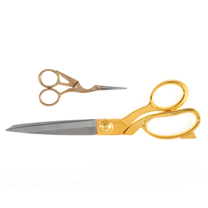 Gold handled dressmaking scissors and stork embroidery scissors