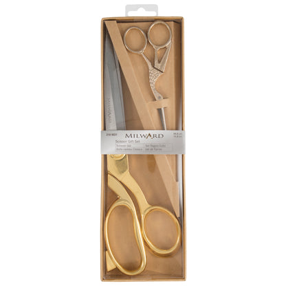 Gold handled dressmaking scissors and stork embroidery scissors