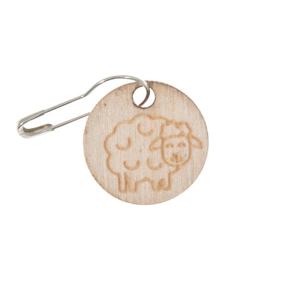 Tub of wooden sheep stitch markers on bulb pins
