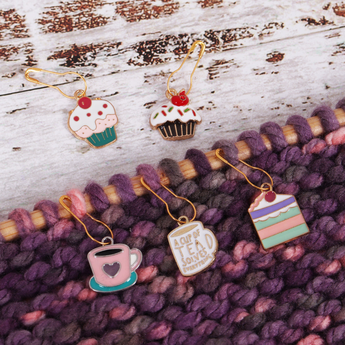 Tub of tea time themed enamel charm stitch markers
