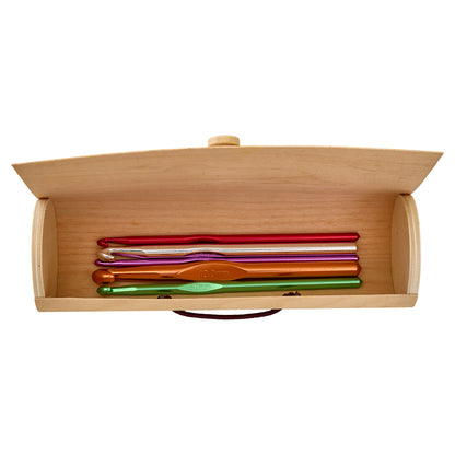 Cylindrical wooden crochet hook case with yarn ball design