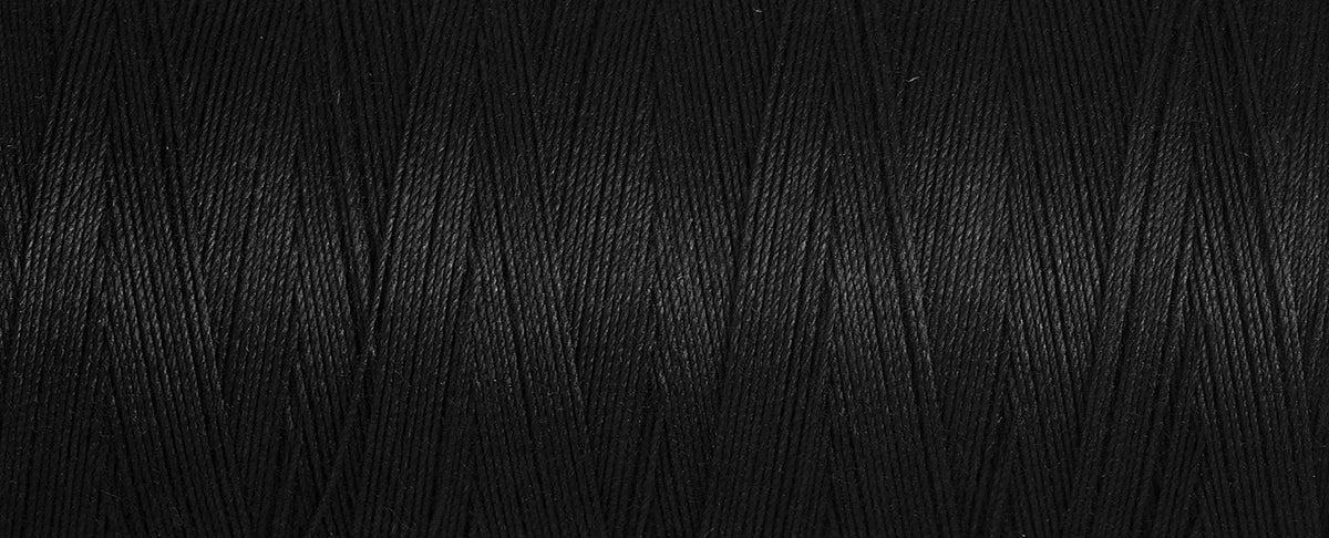 Black spool of Gutermann natural cotton thread