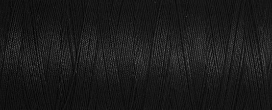 Black spool of Gutermann natural cotton thread