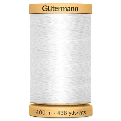 White spool of Gutermann natural cotton thread
