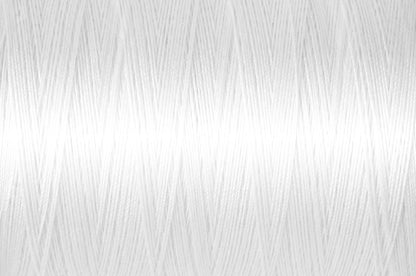 White spool of Gutermann natural cotton thread