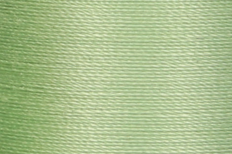 Close-up of pale green Anchor cotton sewing thread on a spool