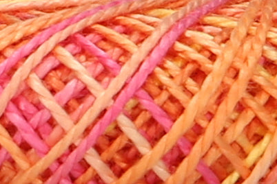 Ball of variegated pink and orange Anchor pearl cotton thread