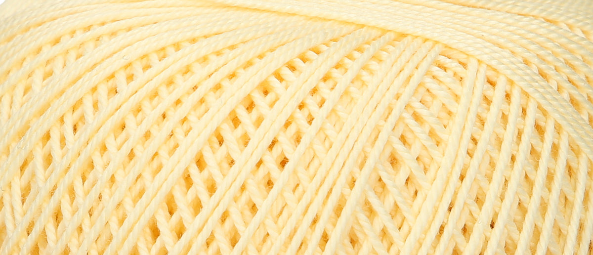 Ball of Puppets Eldorado No 6 cotton yarn in pale yellow
