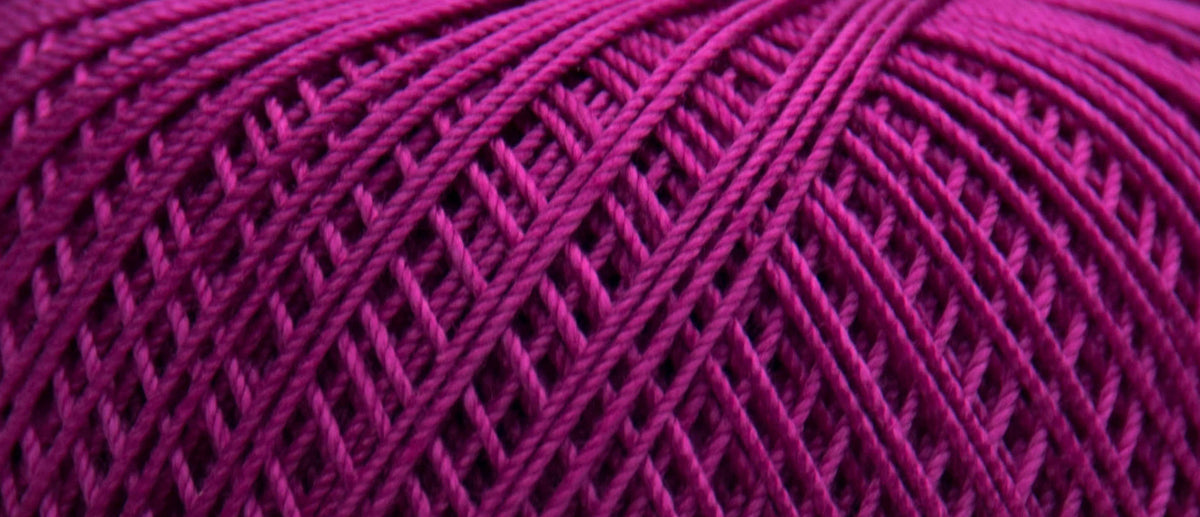 Ball of Puppets Eldorado No 10 cotton yarn in fuchsia