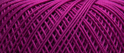 Ball of Puppets Eldorado No 10 cotton yarn in fuchsia