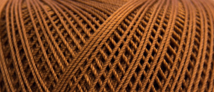 Ball of Puppets Eldorado No 10 cotton yarn in rust