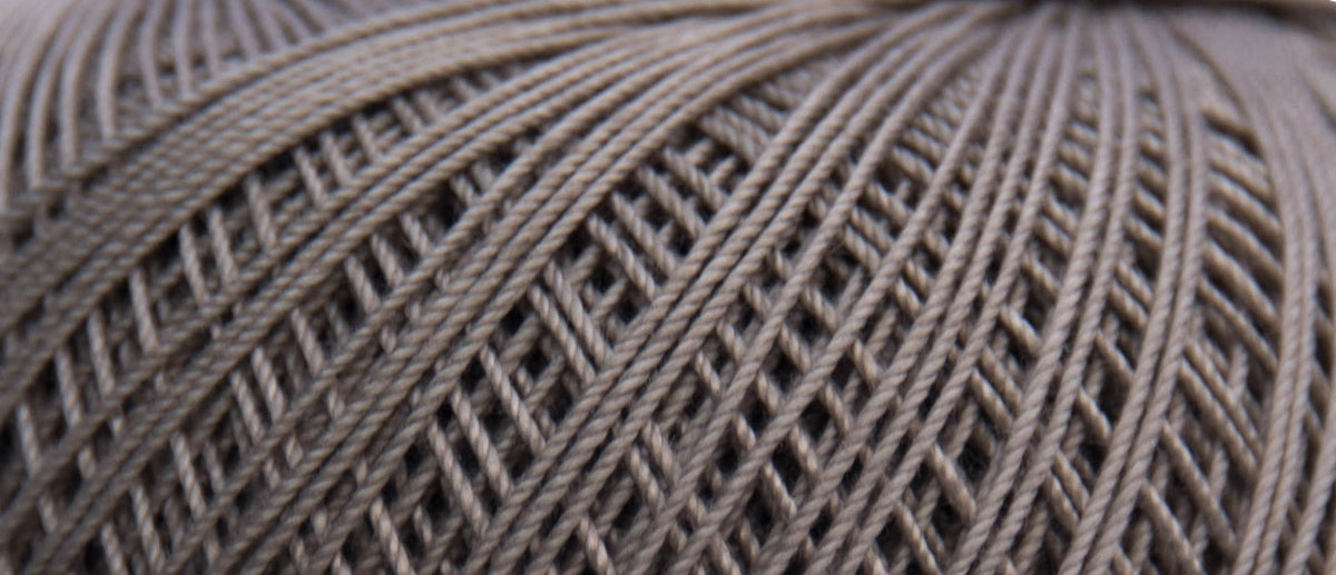Ball of Puppets Eldorado No 10 cotton yarn in taupe