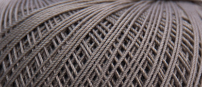 Ball of Puppets Eldorado No 10 cotton yarn in taupe