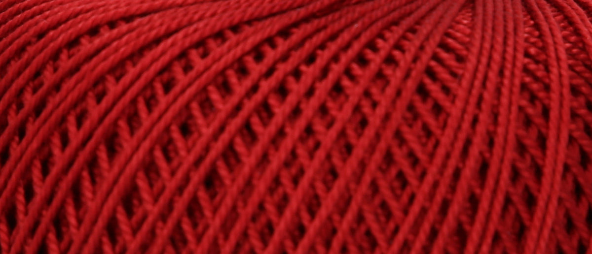 Ball of Puppets Eldorado No 16 cotton yarn in dark red