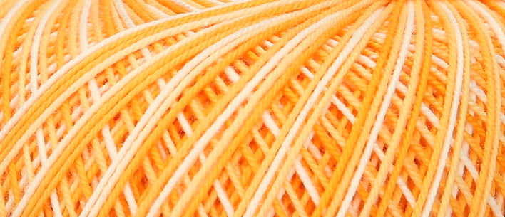 Ball of Puppets Eldorado variegated cotton crochet yarn in orange