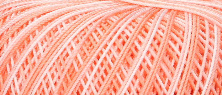 Ball of Puppets Eldorado variegated cotton crochet yarn in coral