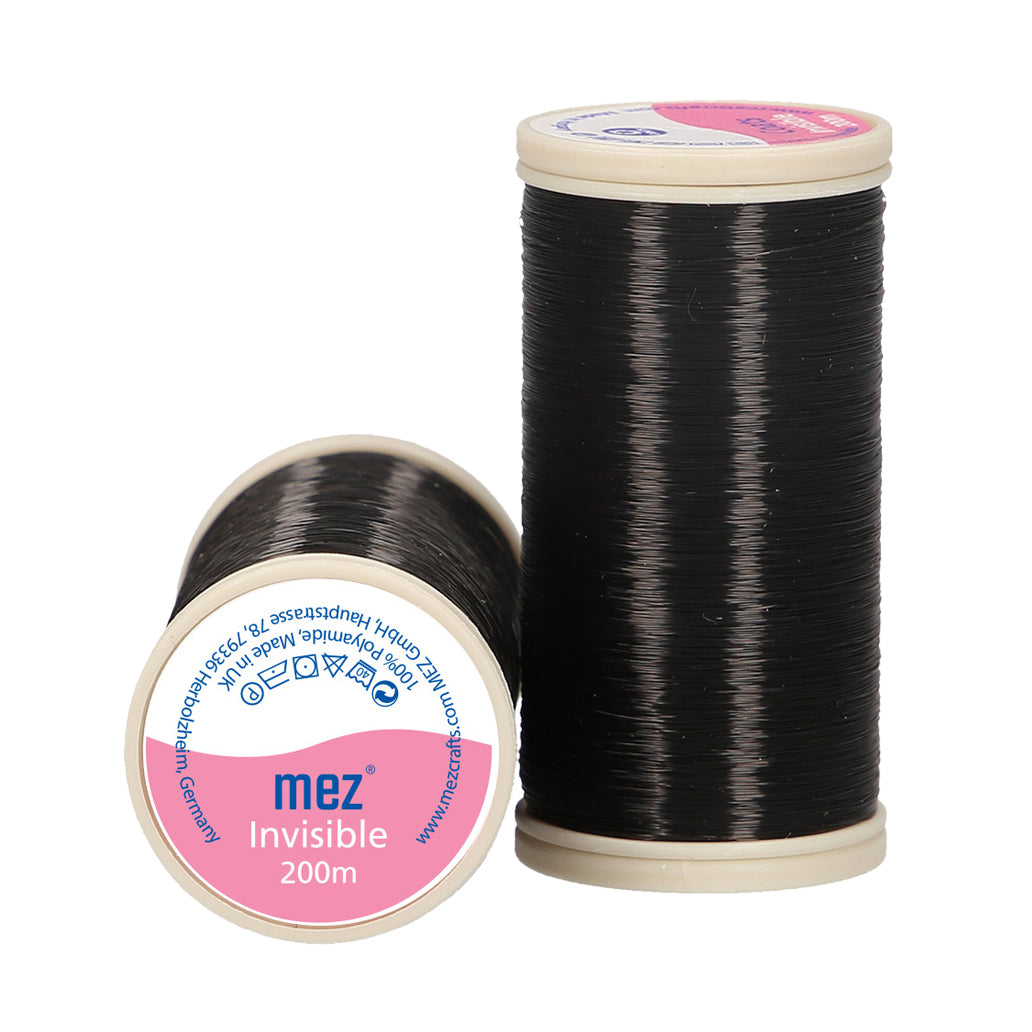 Spool of dark translucent Coats Invisible thread