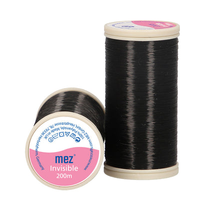 Spool of dark translucent Coats Invisible thread