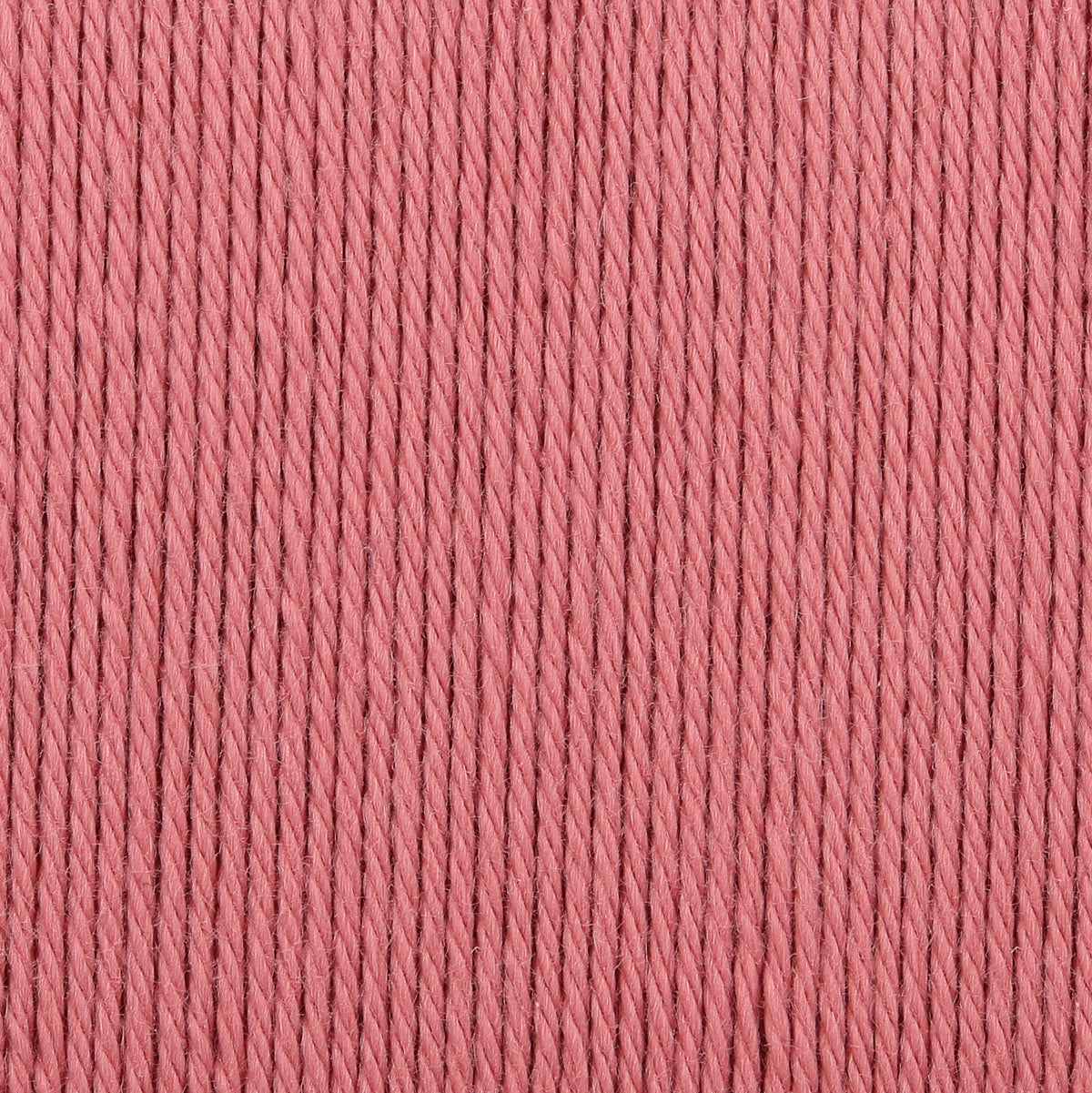 Ball of Anchor Organic Cotton yarn in a dusky vintage rose pink