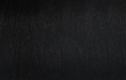 Close-up of black Coats cotton sewing thread