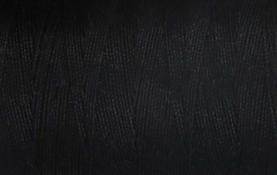 Close-up of black Coats cotton sewing thread
