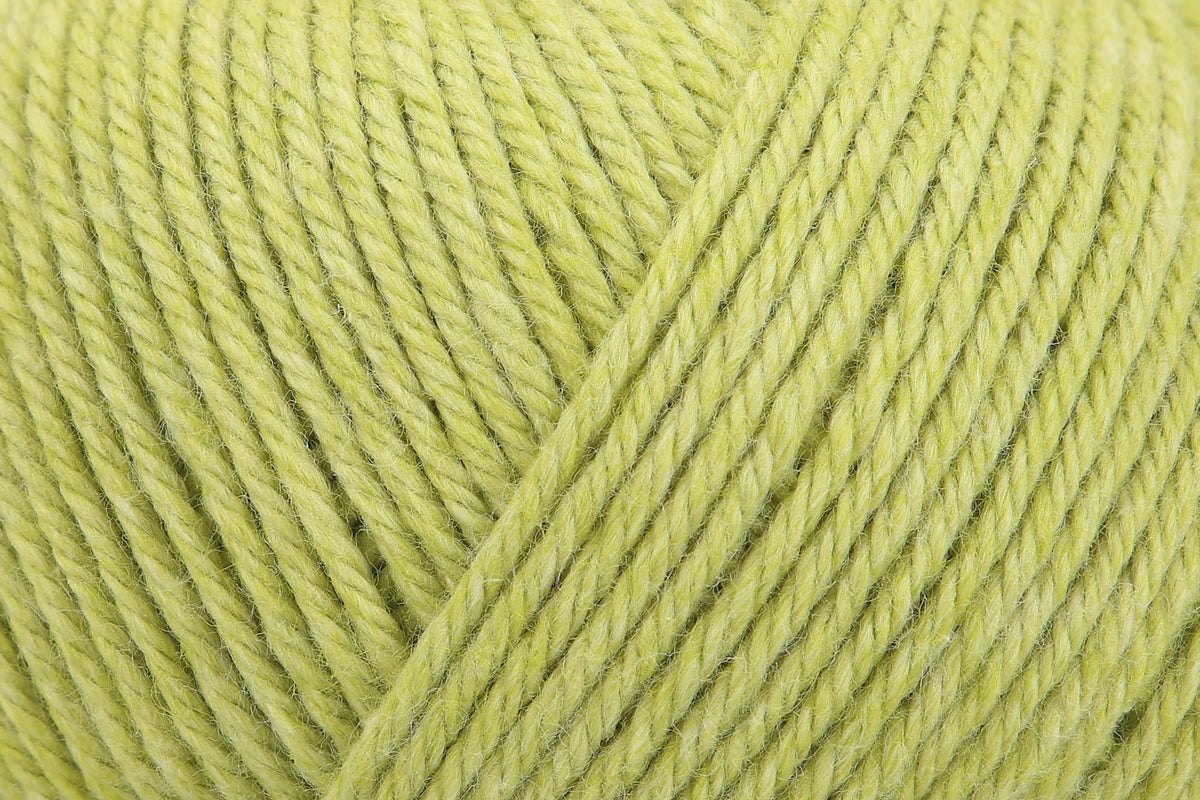 Ball of Anchor Cotton 'n' Wool 4 ply yarn in Peridot
