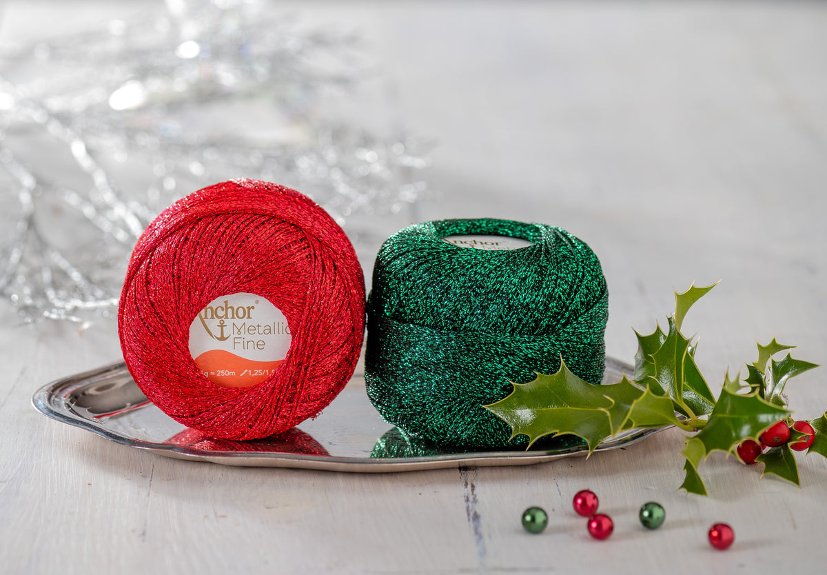 Ball of green Anchor Metallic Fine crochet yarn