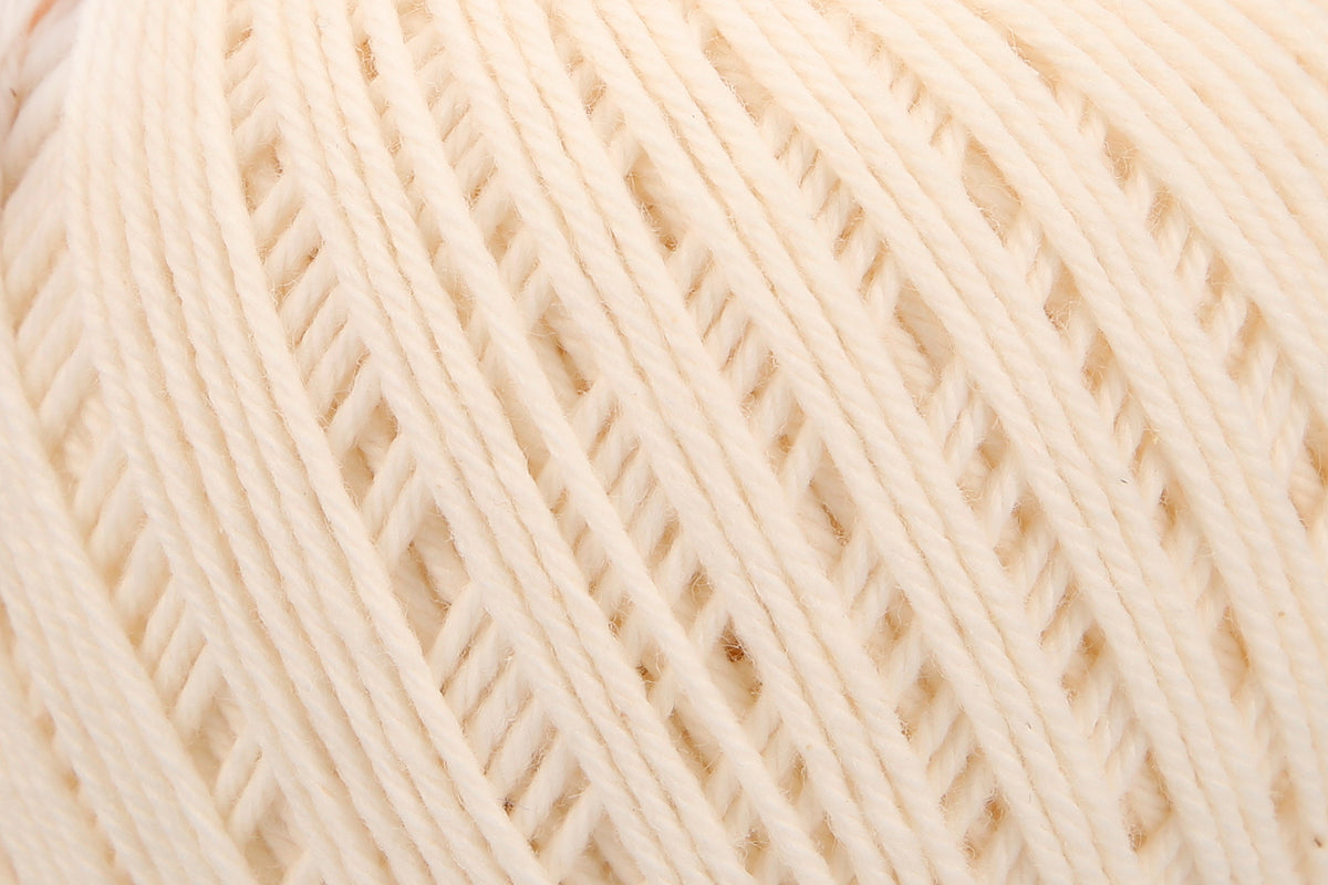 Ball of Anchor Baby Pure Cotton 4 ply yarn in Natural