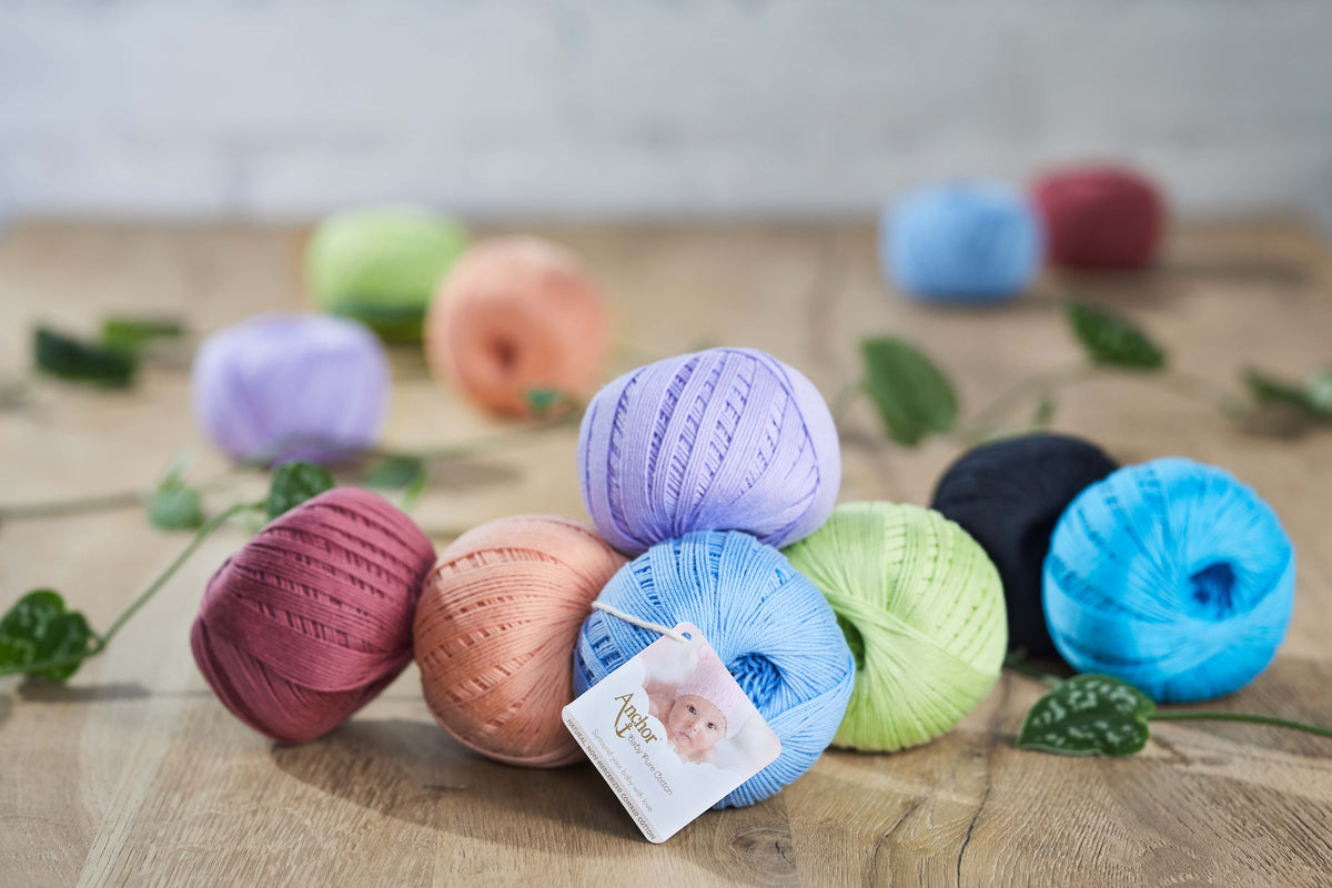 Ball of Anchor Baby Pure Cotton 4 ply yarn in Salmon