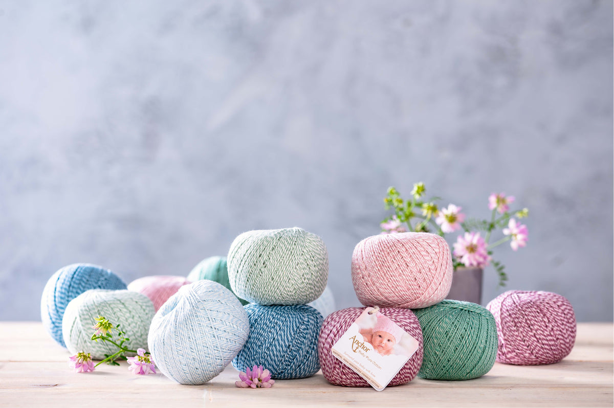 Ball of Anchor Baby Pure Cotton 4 ply yarn in Spotty Blue