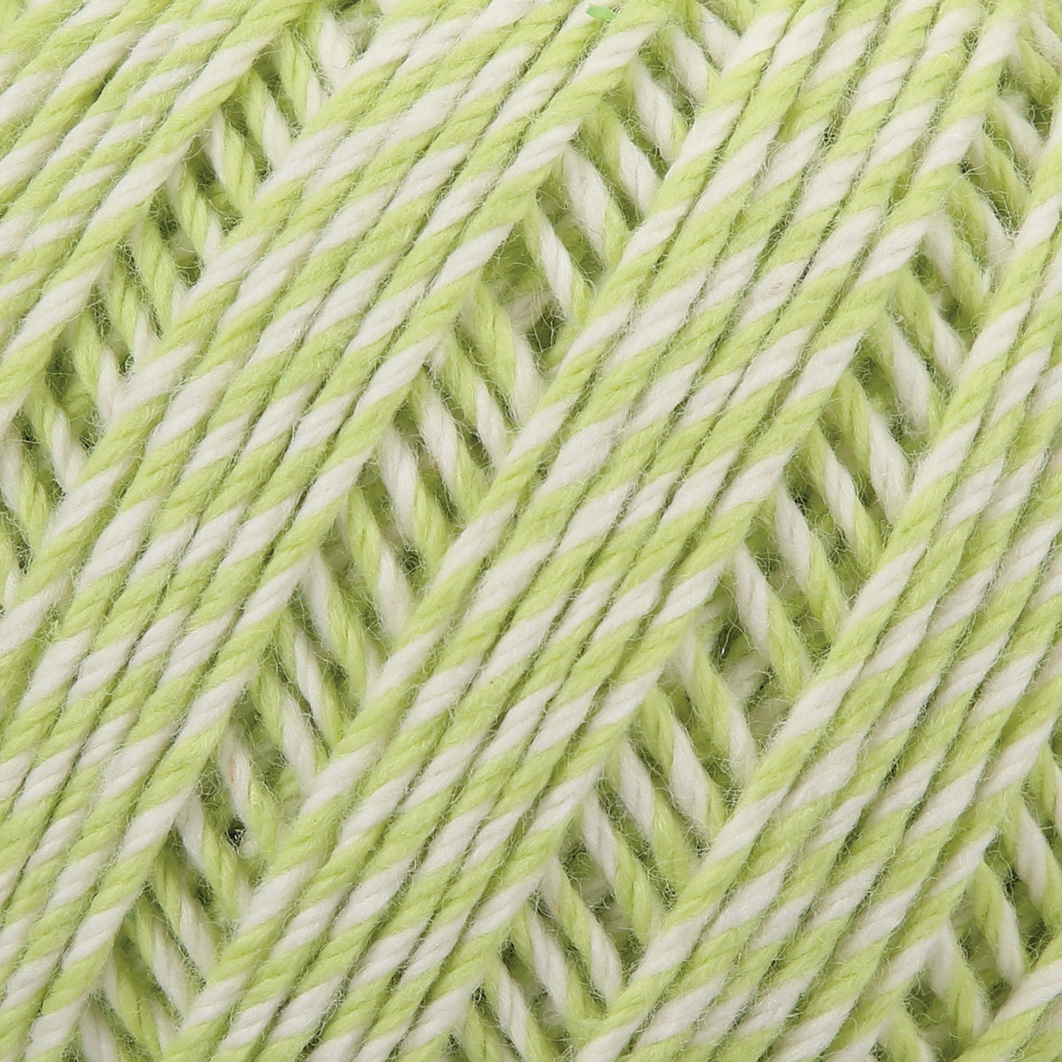 Ball of Anchor Baby Pure Cotton 4 ply yarn in Creamy Lime