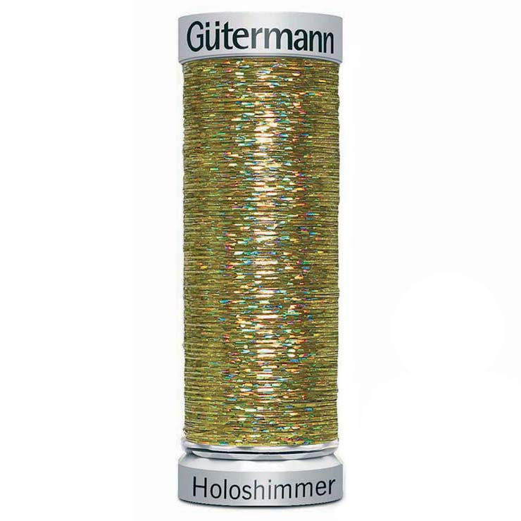Spool of Gutermann Holoshimmer metallic thread in old gold