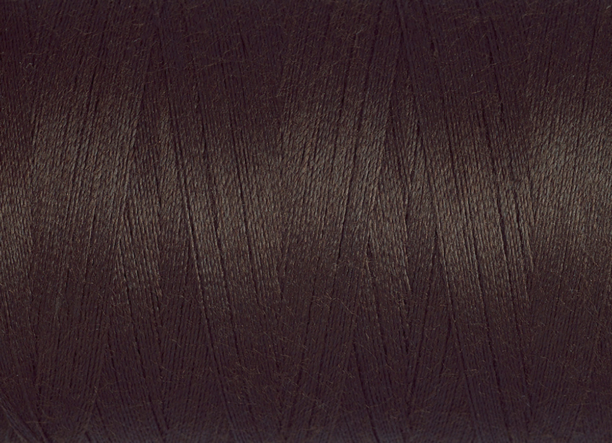 Spool of purple Gutermann Miniking recycled overlocker thread
